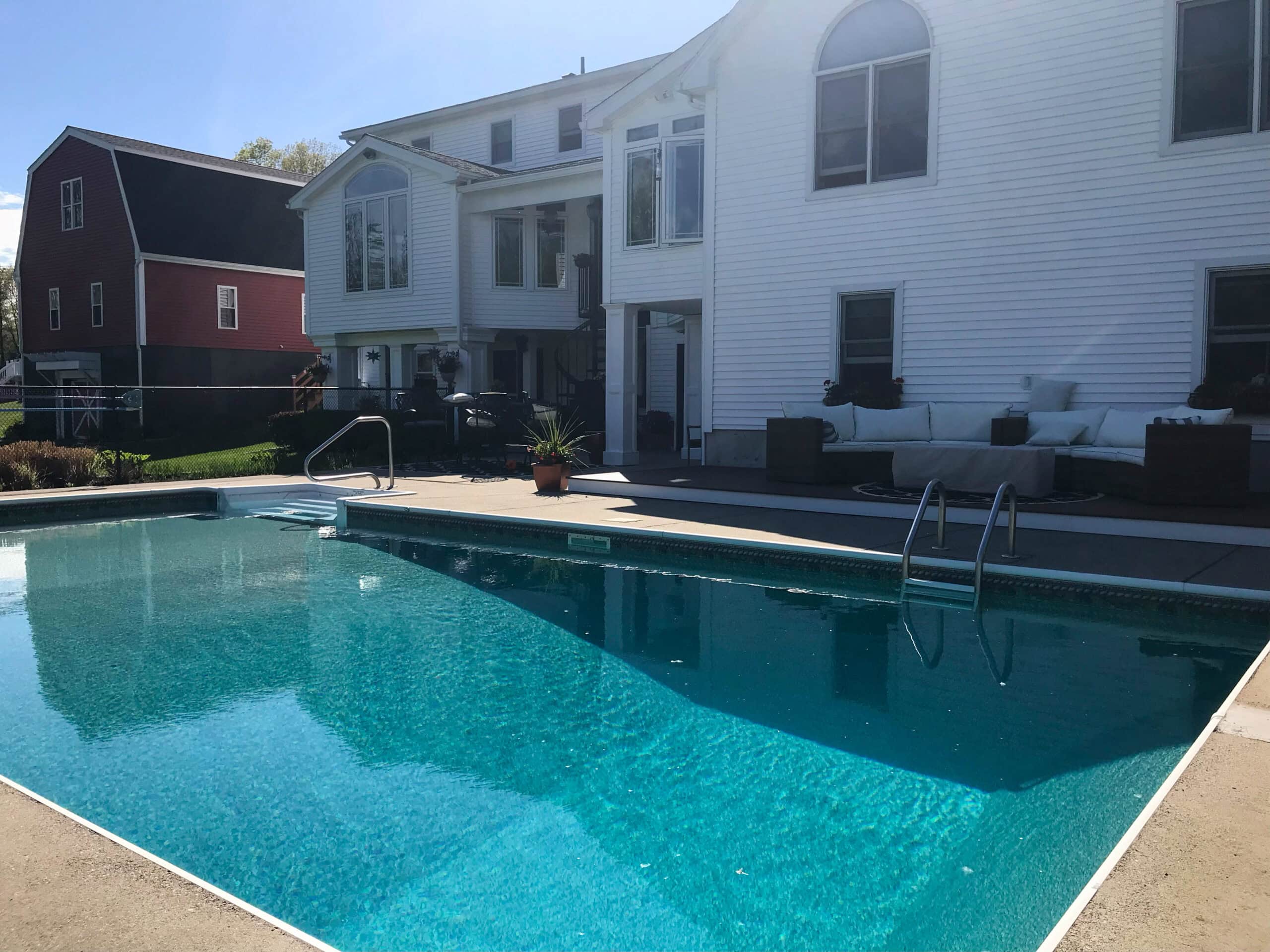 A view of our Auburn, MA client's inground pool before Dex by Terra's pool renovation took place.