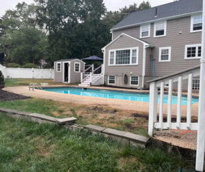 House with pool in backyard before pool renovation by Dex by Terra.