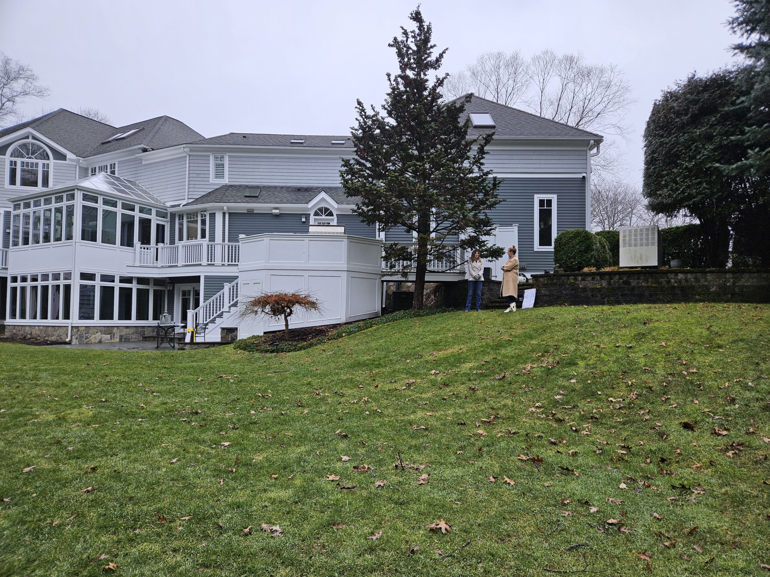 A view of the backyard before Dex by Terra's landscape and hardscape work.