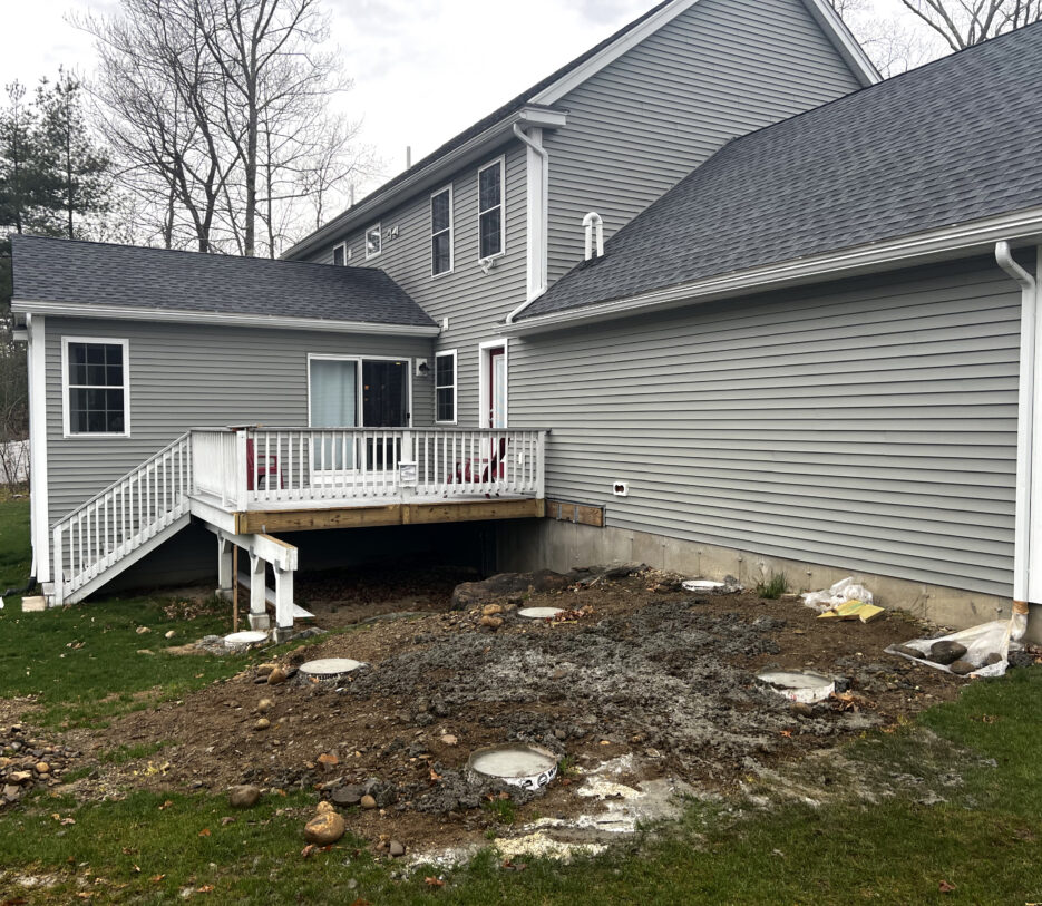 The clients backyard and home before Dex by Terra's work began.